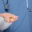 close-up-male-hand-holding-medical-capsule (1)-min