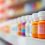 defocused-image-drugstore-shelves-stocked-with-medicine_91128-3536